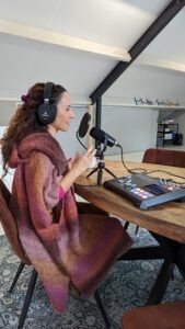 Sara Bigatti recording a podcast for La Scimmia Yoga at the The Running Dutchman Podcast studio