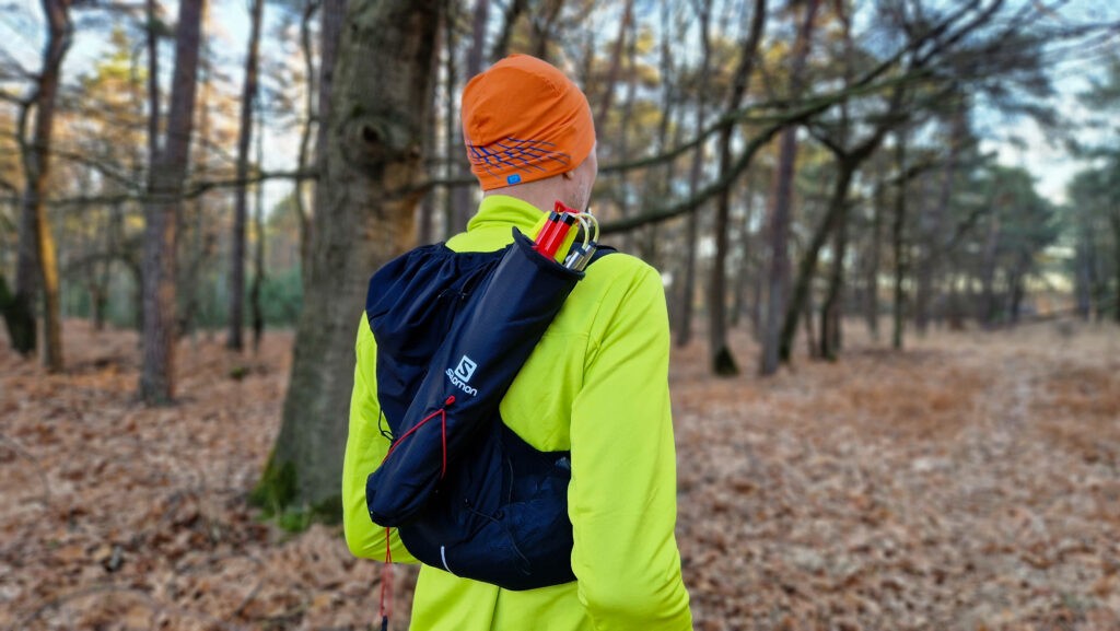 Where do you leave your trail running poles, when you're not using them? In the Quiver, an extra bag you attach to your trail vest. A review.