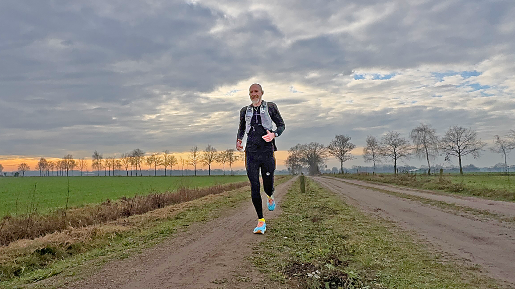 The Running Dutchman training outdoors on a quiet countryside road for the 2026 race season, preparing for marathons, triathlons and a swim-run backyard ultra.